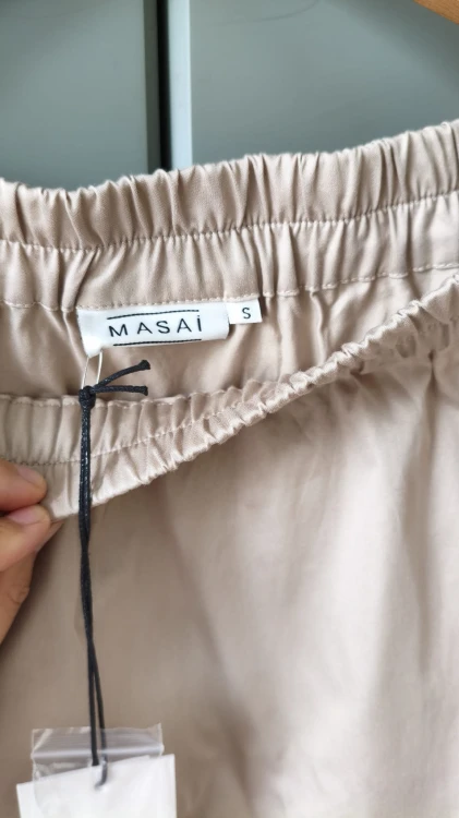 Kjol i bomull från Masai med fickor i beige – bekväm och modern – bild 7